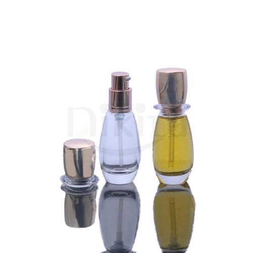 Unique design empty 30ml 40ml 1oz clear glass cosmetic emulsion bottle with rose gold serum pump