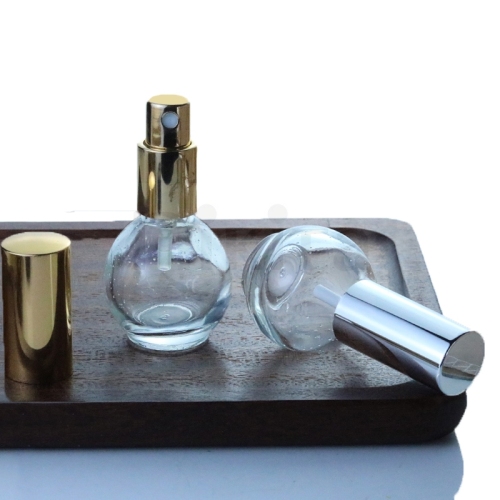 Custom fancy 30ml 1oz thick spherical clear glass cosmetic perfume atomizer bottles with gold silver sprayer