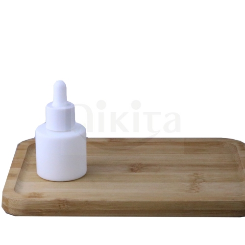 Low MOQ 30ml 60ml 1oz 2oz round opaque white glass cosmetic essential oil bottles with serum pipette