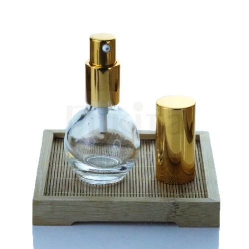 High quality custom 1oz 30ml sperical clear glass cosmetic face serum oil bottles with gold silver aluminum pump
