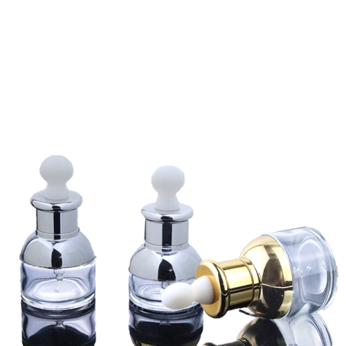 Hot Sale Luxury 1oz Serum Bottle 30ml 50ml Round Clear Glass Dropper Bottle With Gold Silver Aluminum Shoulder