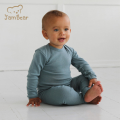 Organic merino knit baby onesie sustainable merino baby romper long sleeve eco friendly organic knitted baby romper
