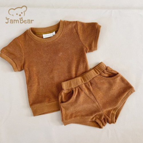 Organic cotton baby ribbed long sleeve flutter onesie eco friendly ribbed infant onesie sustainable long sleeve baby bodysuit