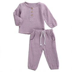 Solid color kids muslin clothing set organic cotton toddler top and pant Long Sleeve kid pullover and pant set
