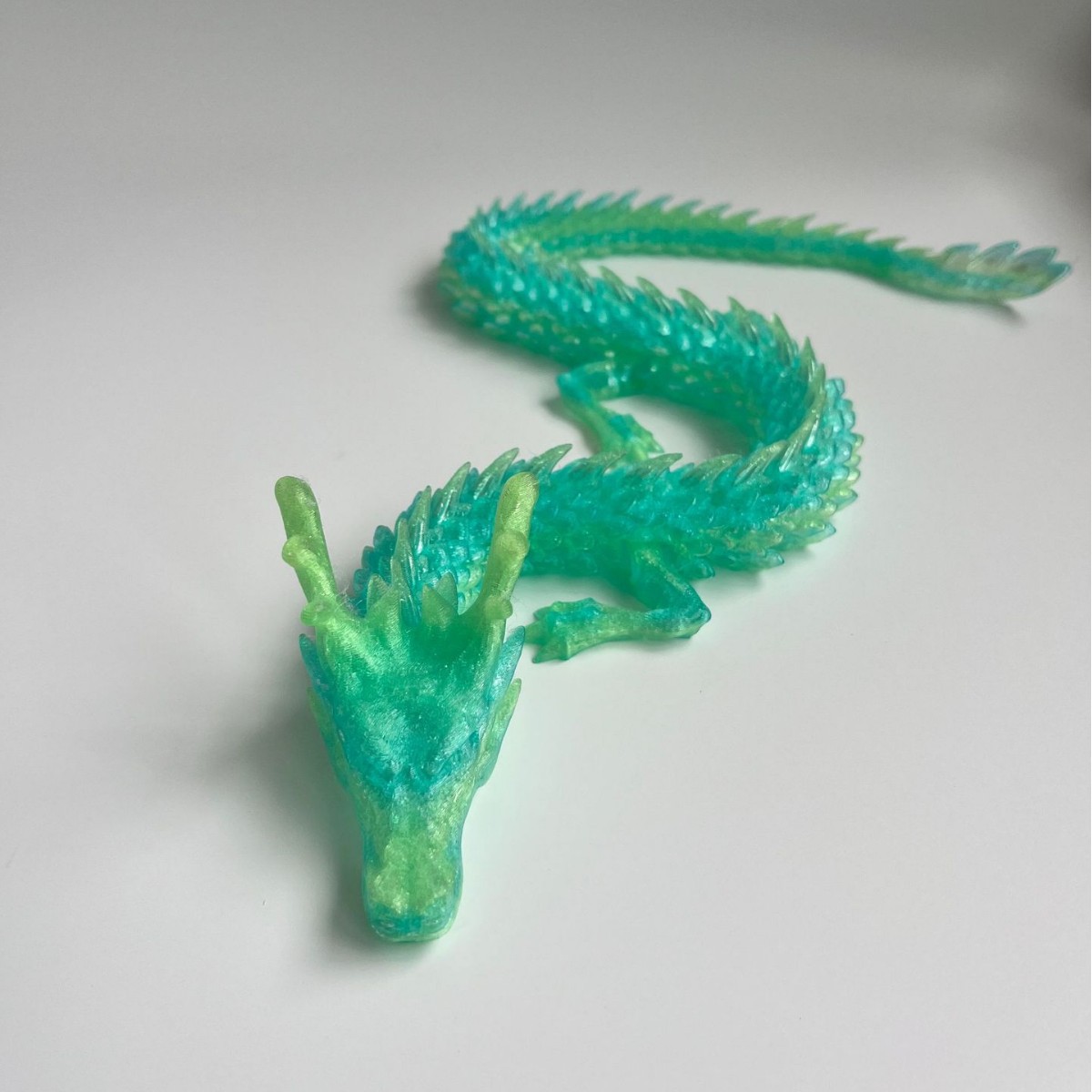 Various decorative items and components printed using FDM (Fused Deposition Modeling).