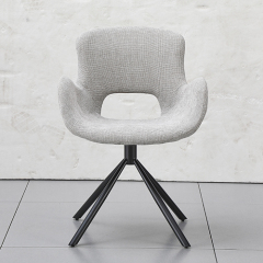 Beige Swivel Chair With a Hole On Back