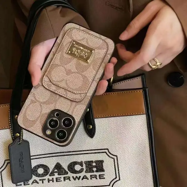 コーチ iPhone15 Pro/14 Proケース シグネチャー柄 COACH iPhone15 Pro 