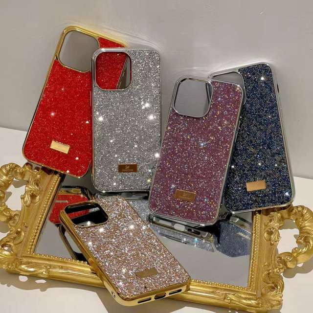 SWAROVSKI iPhone14 ProMaxケース ロゴ金具付き