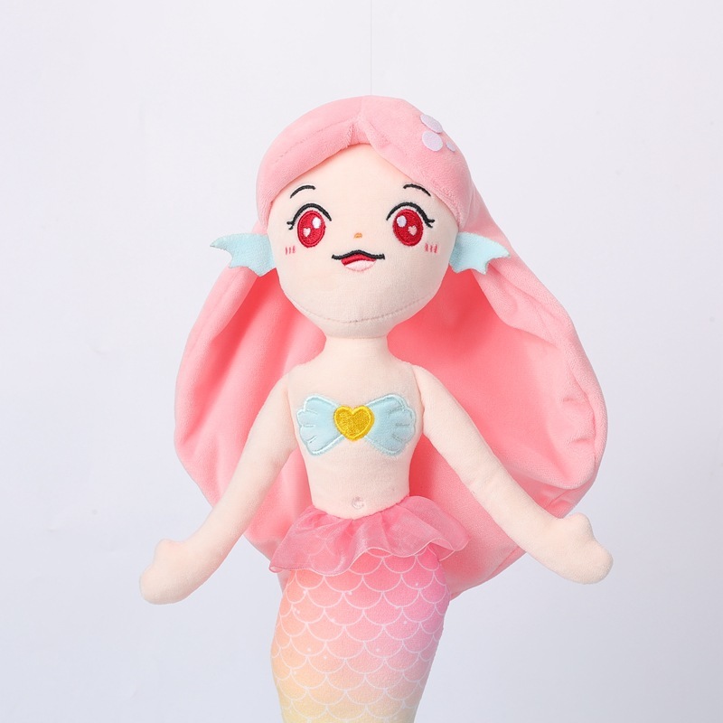 The pink mermaid plush toy