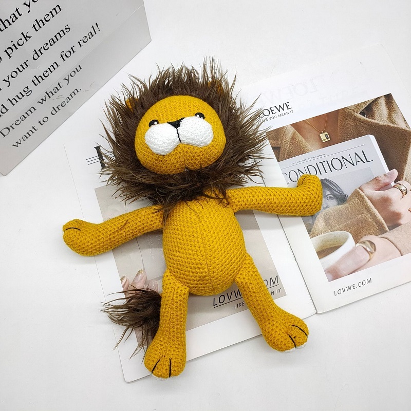 Knitted lion plush toy