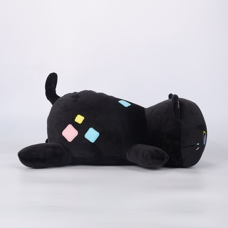 Black patch cat pillow