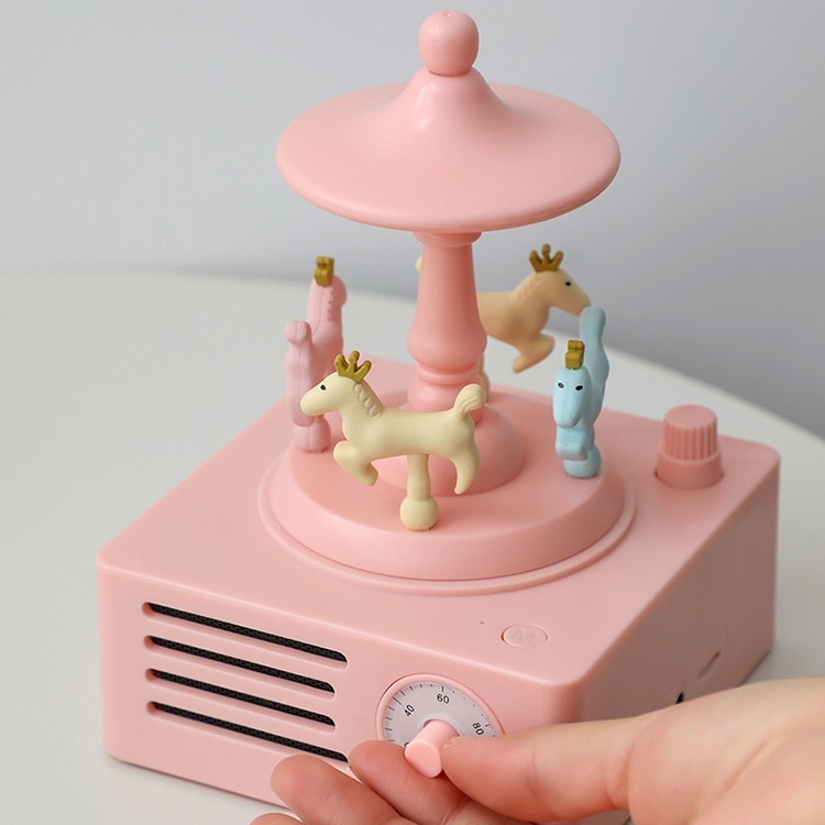 Rotating Carousel Bluetooth Speaker