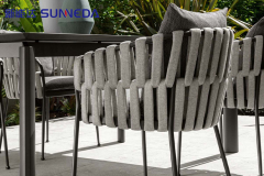 630425Upholstered fabric garden chair with armrests