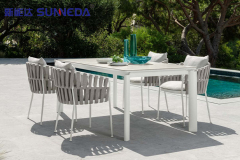 630425Upholstered fabric garden chair with armrests