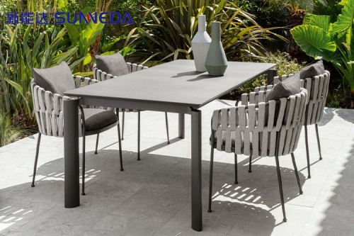 630425Upholstered fabric garden chair with armrests