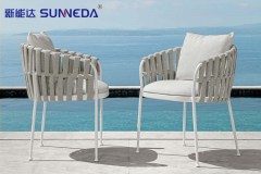 630425Upholstered fabric garden chair with armrests