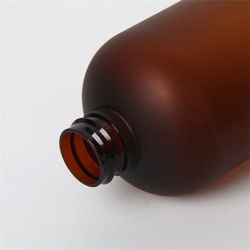500ml Amber Boston Round Frosted Plastic Cosmetic Serum Lotion Bottle With Gold Disc Cap