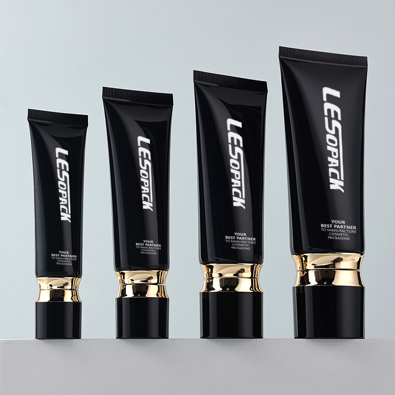 Luxury OEM black golden shoulder round cosmetic squeeze tube hand cream shampoo packaging