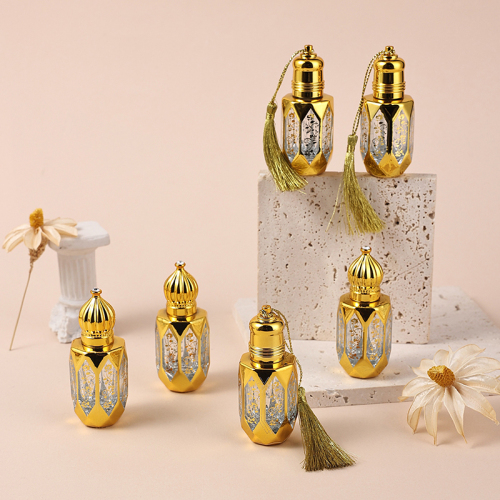 Refillable 12ml luxurious golden essential oil roller ball glass bottle 10 pieces tassel cap
