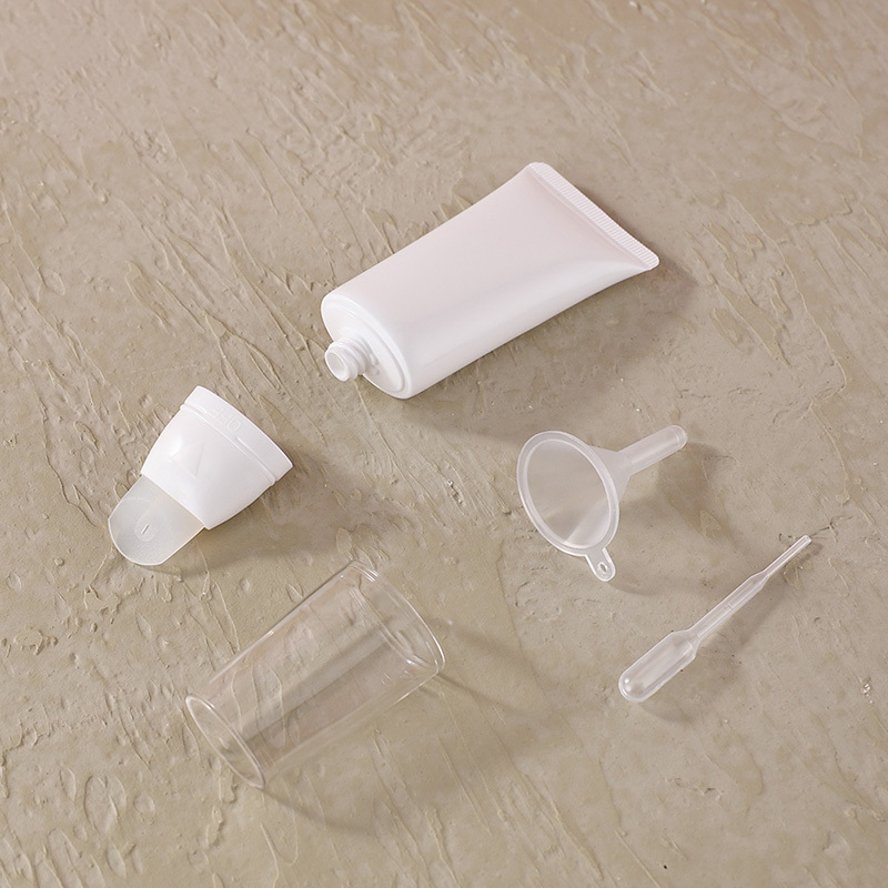 Ready to ship 30ml white glossy cosmetic tube silicone applicator skincare dispenser container