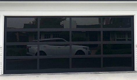 What are the types of sectional garage doors?