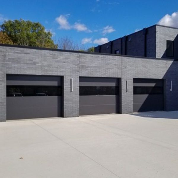 Flush Garage Doors with Black Mirror Glass
