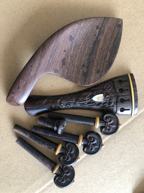 1 set of 4/4 size  violin fittings rose wood made hand carved completely including chin rest , tailpiece , 4 pegs and endpin