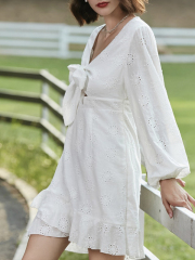 OMONSIM Wholesale new white temperament slim and sweet puff sleeve dress bow hollow design irregular skirt women