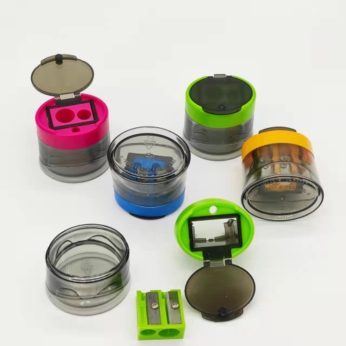 Barrel with lid pencil sharpener