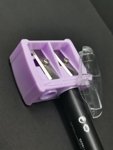 Double hole eyebrow pencil sharpener