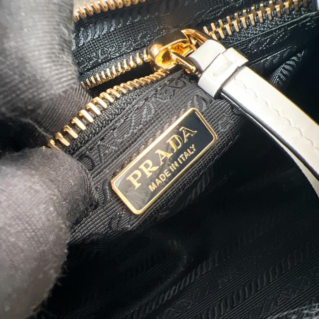 프라다 보니  가죽 핸드백 미니 1BA486