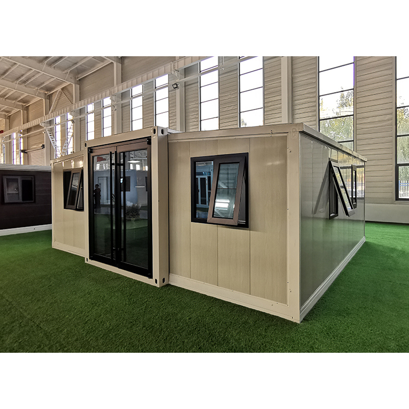 Expandable container house with triangular roof