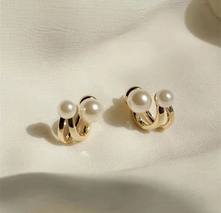 Pearl Ear bones Gold Earrings.