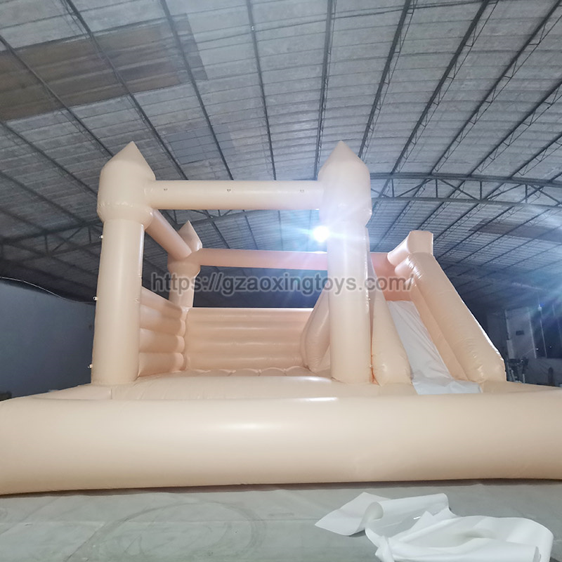 Beige Inflatable Bounce House With Slide And Ball Pit