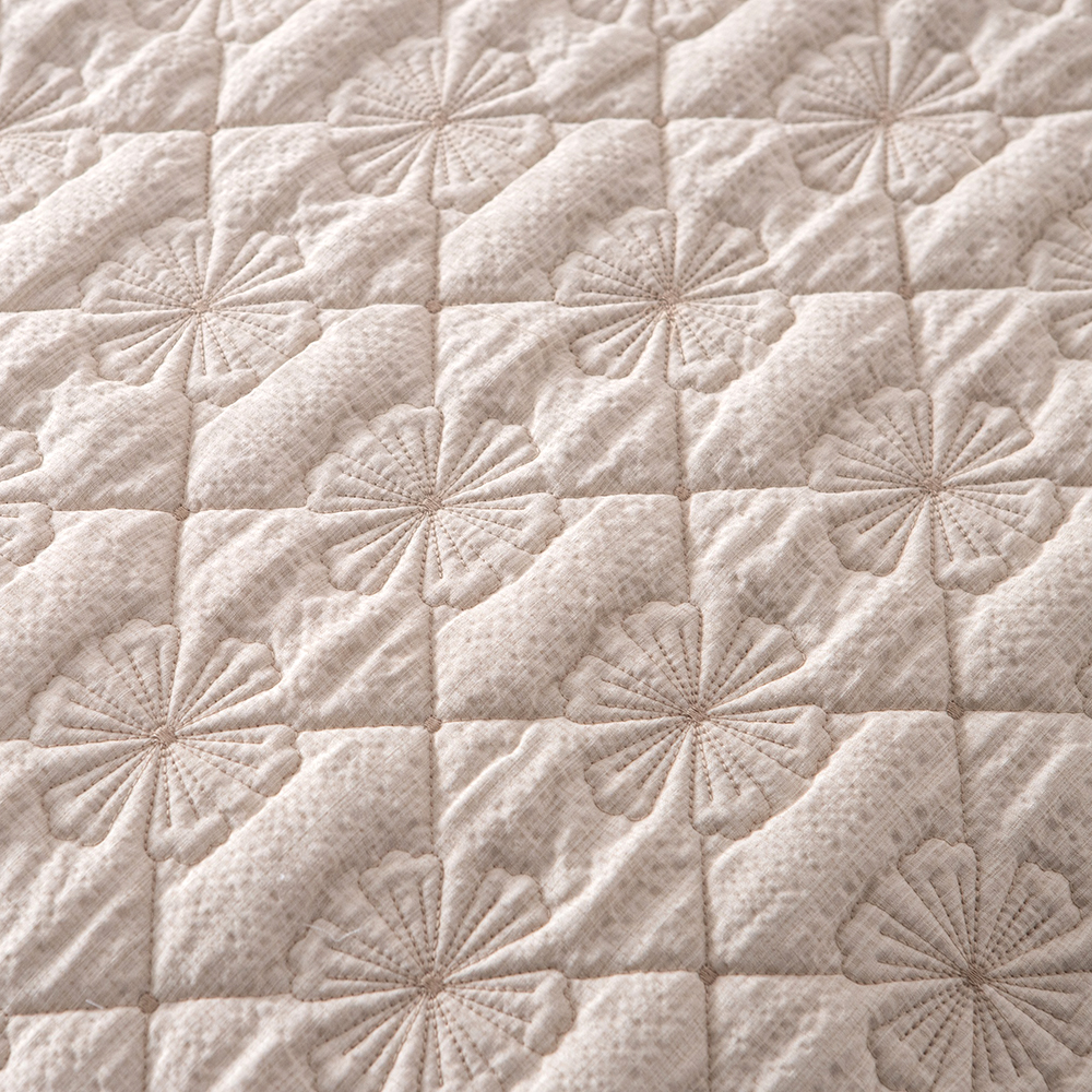 Elegant Embroidered Quilt with Ruffle Edge
