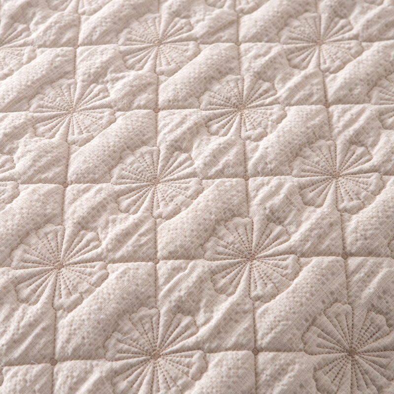 Elegant Embroidered Quilt with Ruffle Edge