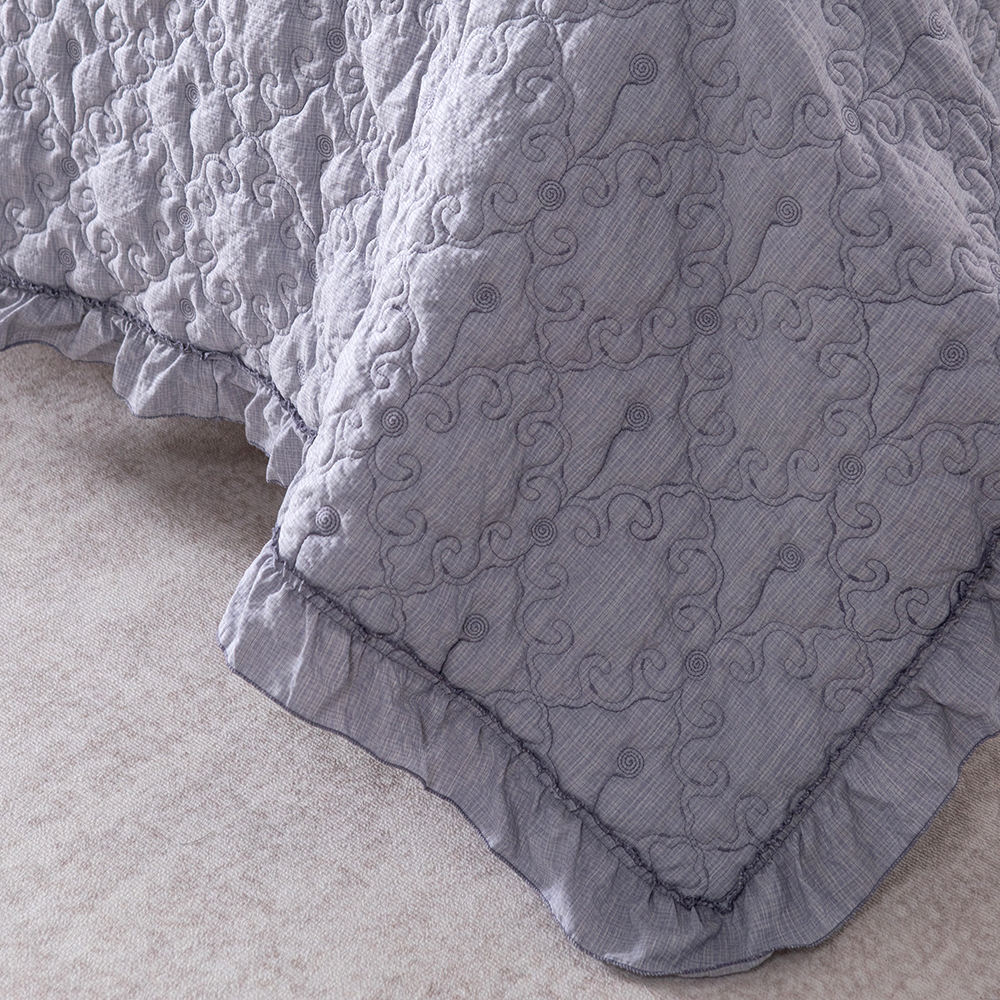 Elegant Embroidered Quilt with Ruffle Edge