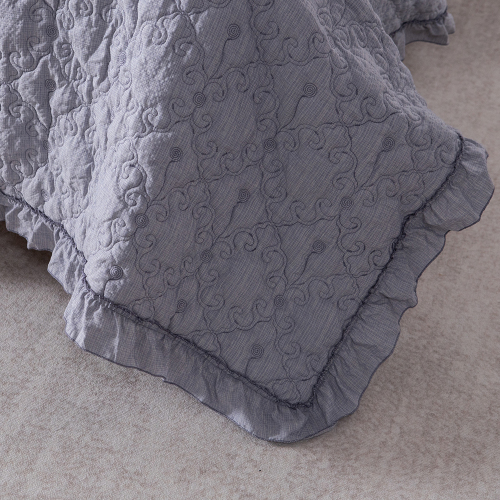 Elegant Embroidered Quilt with Ruffle Edge