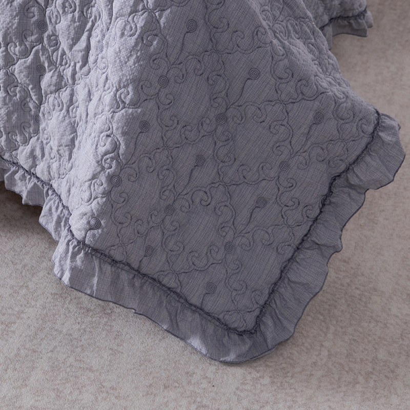 Elegant Embroidered Quilt with Ruffle Edge