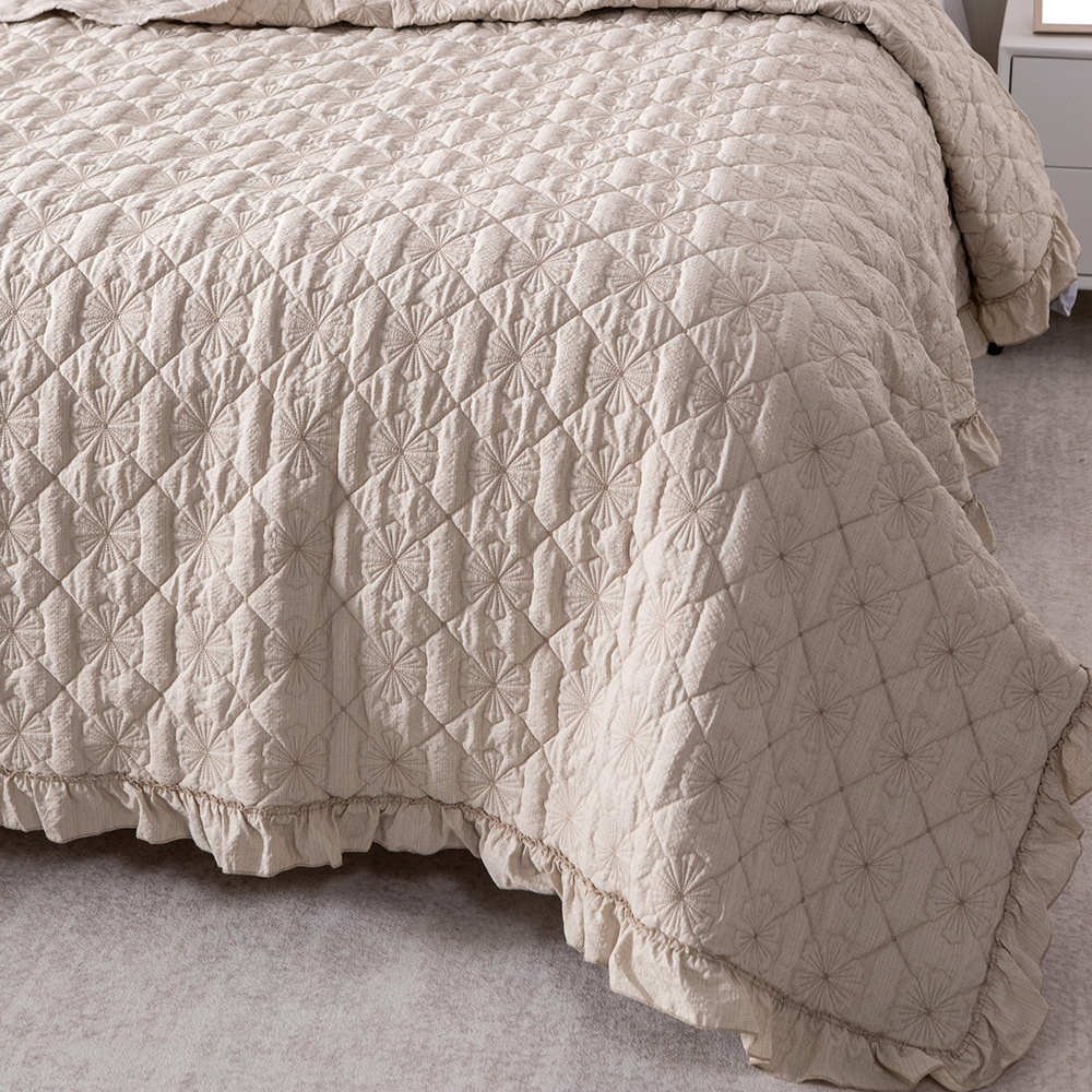 Elegant Embroidered Quilt with Ruffle Edge