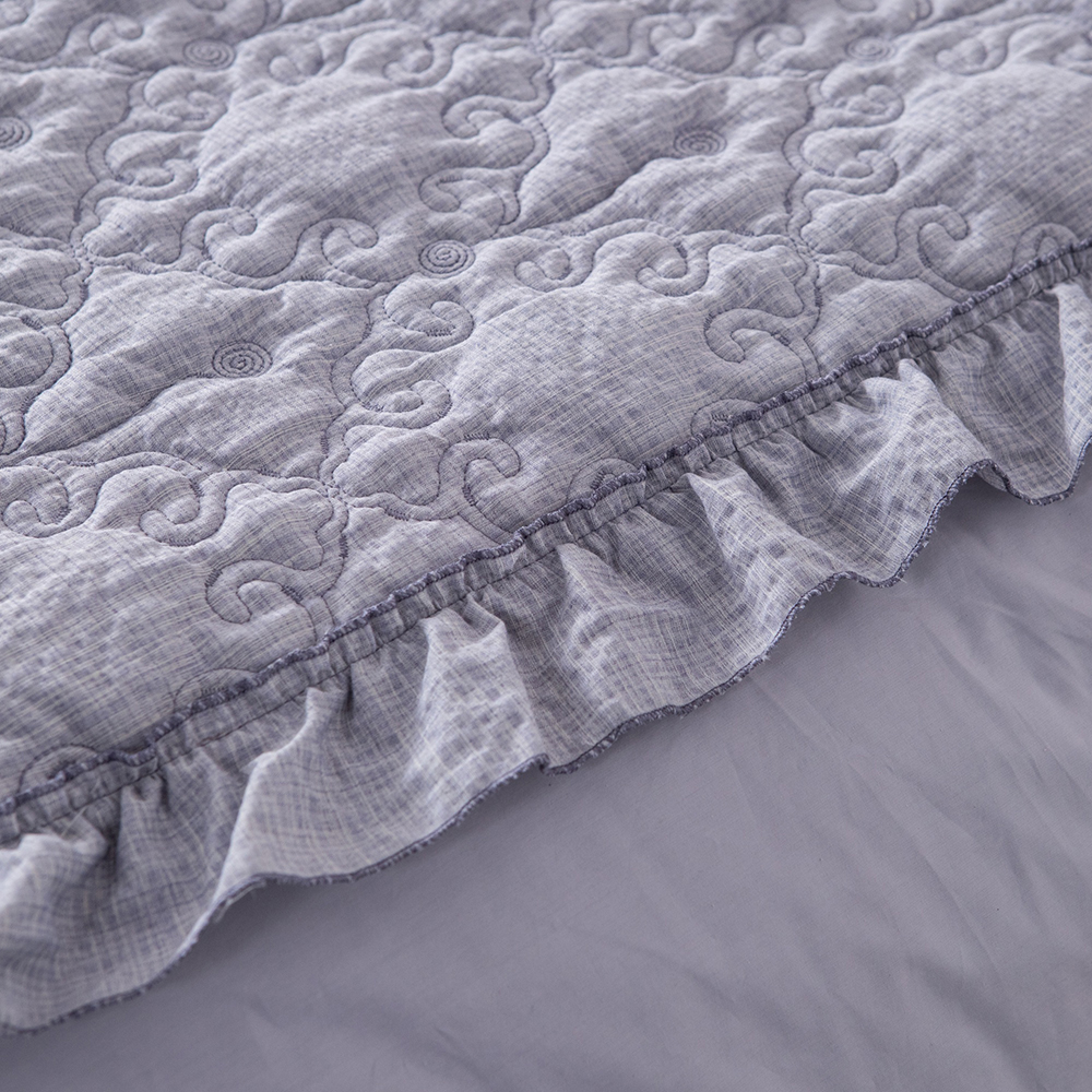 Elegant Embroidered Quilt with Ruffle Edge