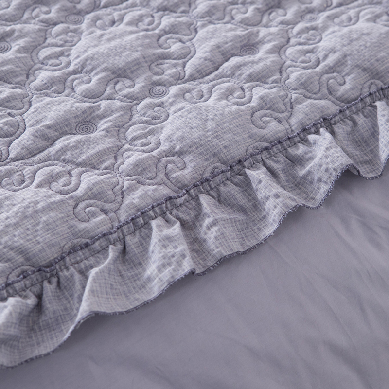 Elegant Embroidered Quilt with Ruffle Edge