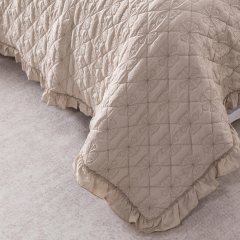 Elegant Embroidered Quilt with Ruffle Edge