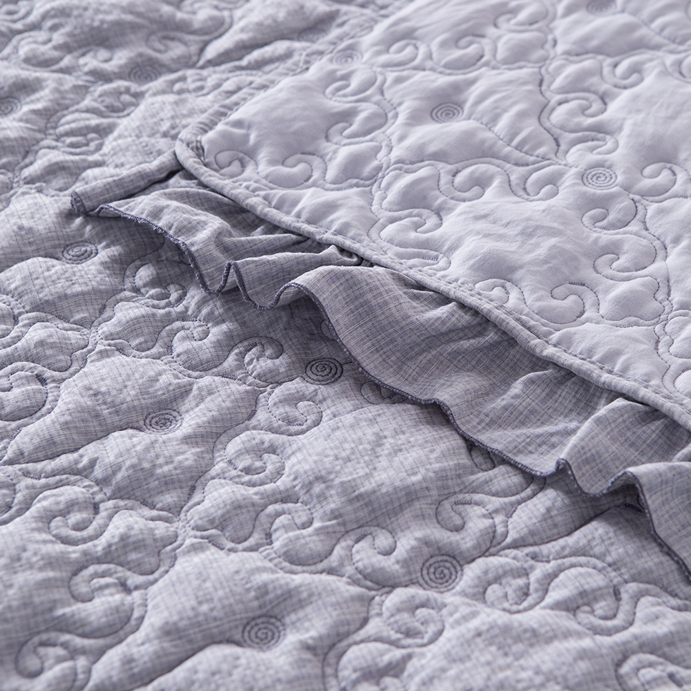 Elegant Embroidered Quilt with Ruffle Edge