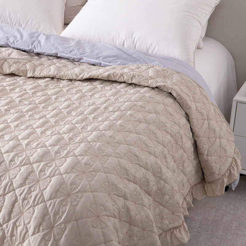Elegant Embroidered Quilt with Ruffle Edge