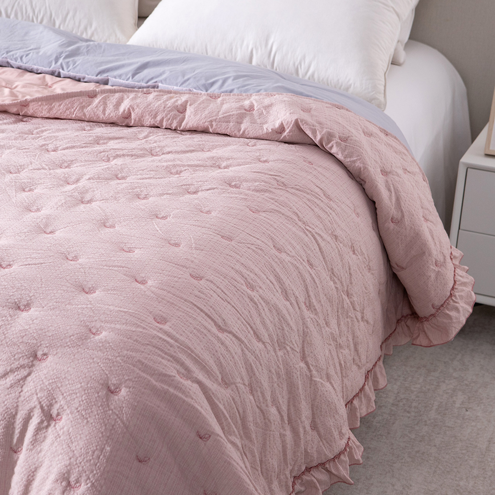Elegant Embroidered Quilt with Ruffle Edge
