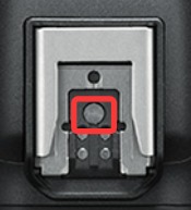 Camera hot shoe with center contact