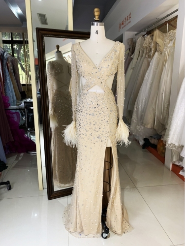 Gold long sleeve rhinestone feather lace up back side slit prom evening dress