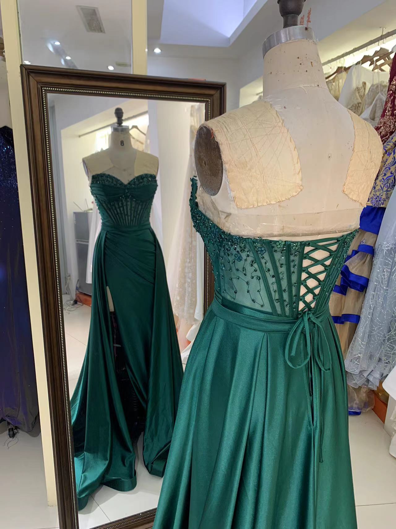 See through corset emerald green sleeveless beading hand pleated mermaid prom evening dresses with overskirt