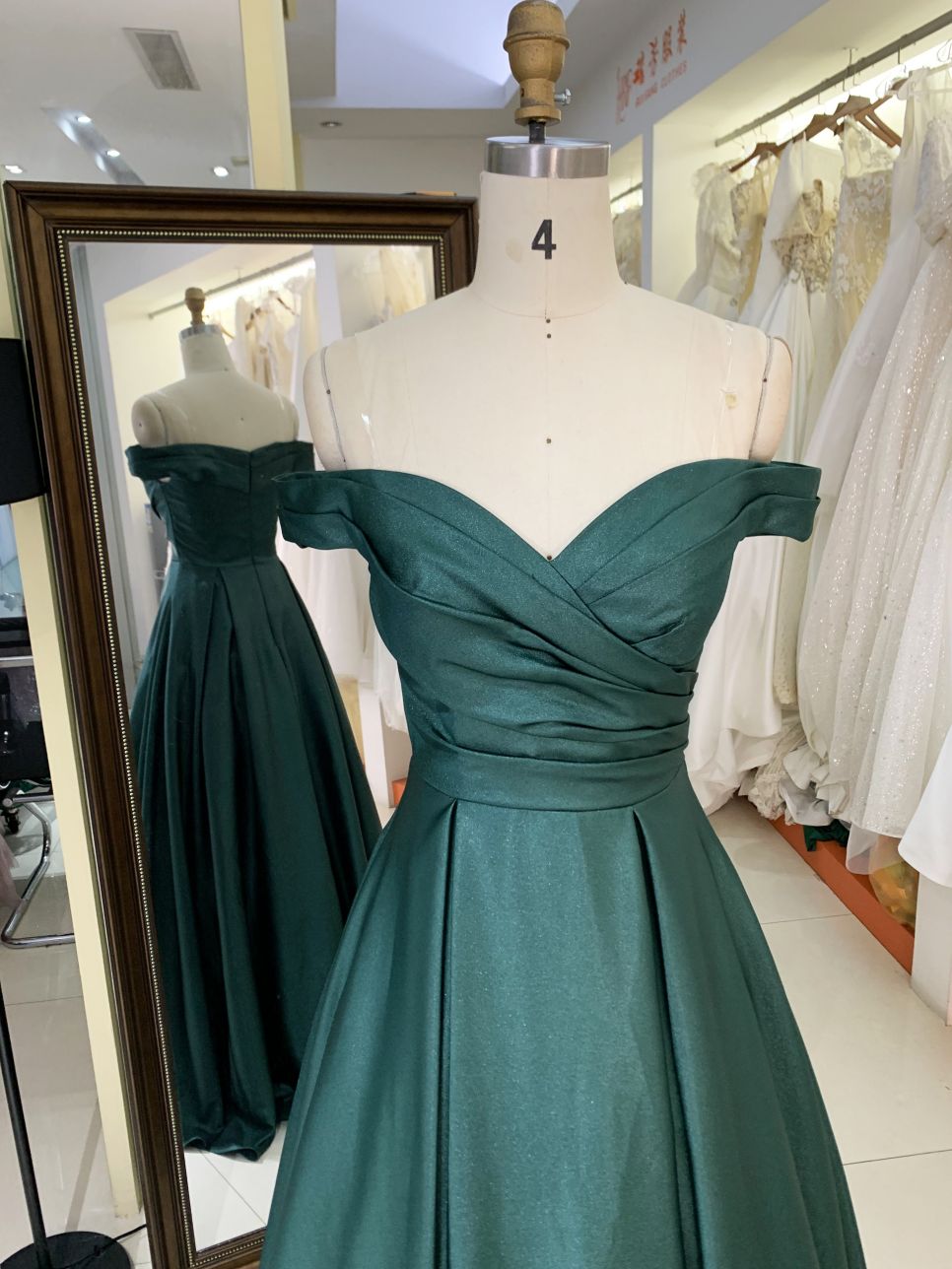 2025 wholesale emerald green off shoulder hand pleated satin A line prom dresses